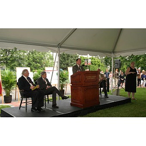 General Richard Neal speaks from a stage at the Veterans Memorial groundbreaking ceremony