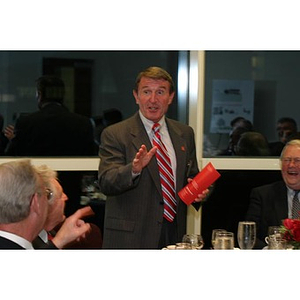 Retired General Richard Neal gestures at the Veterans Memorial dinner