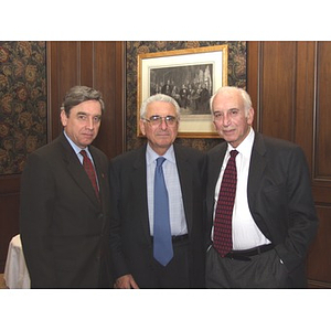 President Richard Freeland poses with John Hatsopoulos, center, and an unidentified man, on right, at the gala dinner honoring John Hatsopoulos