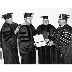 Honorary degree recipients Ted Kennedy and Cardinal Cushing pose with escort William Rand and President Knowles