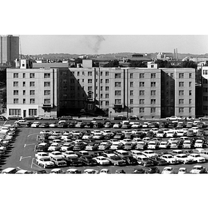 West Dormitory for Men and a large parking lot