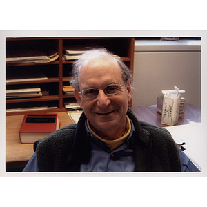 Head and should portrait of School of Law Professor Stephen Subrin in his office