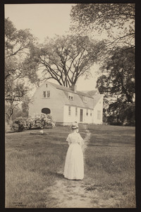 Woman walking toward the Gates House, Framingham, Mass.