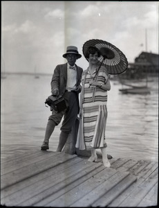 George S. Akasu, with camera, and wife Mary Ann at the shore
