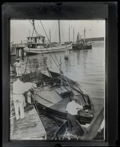 Burned hull of the motorboat owned by Harry Richman in which a party of Ziegfield Follies and other Broadway principals narrowly escaped death when the gasoline tank exploded