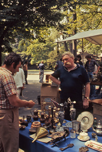 Man selling in an outdoor market