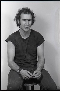 Studio portrait of Richard Safft, seated on a stool