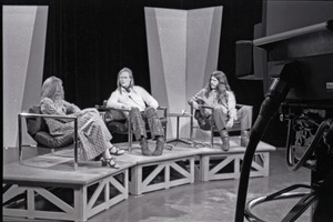 Commune members at the WGBY Catch 44 (public access television) interview: Anne Baker, Jim Baker, and Bruce Geisler on stage