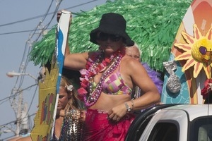 Parade marchers on a float : Provincetown Carnival parade