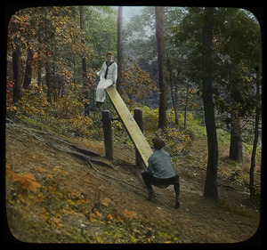 Playground on Sugarloaf (boy and girl on seesaw)