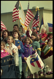 Crowd with flags greeting the USS Roberts returning from Persian Gulf War duty