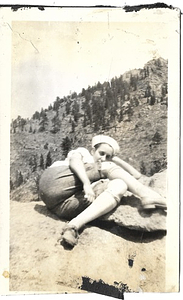 A Photograph of Dorris Bullard Sitting on a Rock