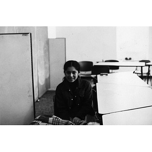Hispanic American teenage girl facing front, seated in a classroom at La Alianza Hispana headquarters, Roxbury, Mass.