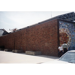 Partial view of the building which houses the ceramic tile Plaza Betances mural.