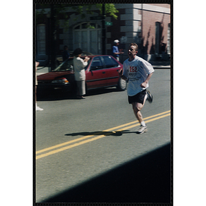 A man runs the Battle of Bunker Hill Road Race