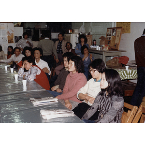 Chinese Progressive Association members attending a dinner and meeting