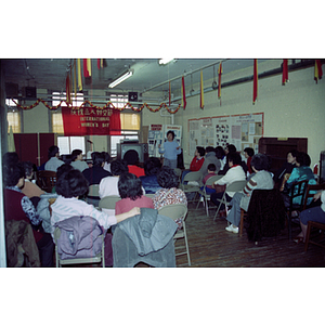 Guests eating at an International Women's Day event