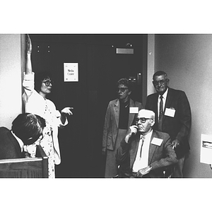 A woman gives a tour of Snell Library on the day of its dedication