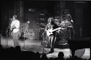 Grateful Dead concert at Springfield Civic Center: band in performance: Bob Weir, Jerry Garcia, Bill Kreutzmann (l. to r.)