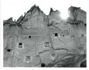 Cave houses on sheer cliff