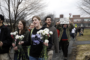 Justice for Jason rally at UMass Amherst: protesters marching from the Student Union Building in support of Jason Vassell