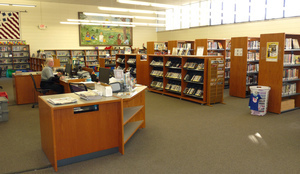 East Brookfield Public Library: reference desk and books stacks