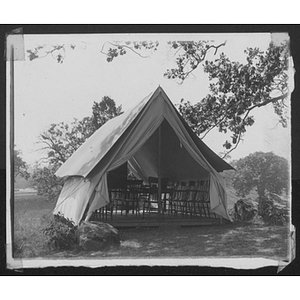 Canvas tent with seating at Camp School, Allston