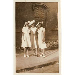 Inez Irving and her friends pose in their Sunday dresses