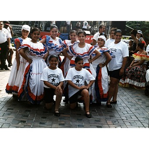 Young dancers pose for a picture in their dance costumes at Festival Betances.