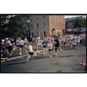 Children and adults run the Battle of Bunker Hill Road Race