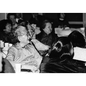 Guests attend a dinner held at Josiah Quincy School celebrating Chinatown's victory to build a community center on Parcel C