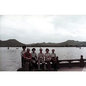 Chinese Progressive Association members, including Henry Wong, on a waterfront in China