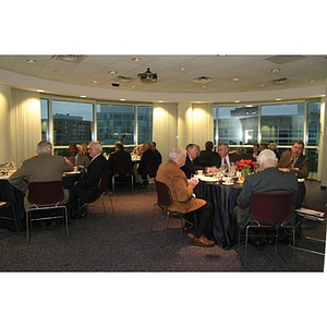 Guests sit at round tables during the Veterans Memorial dinner