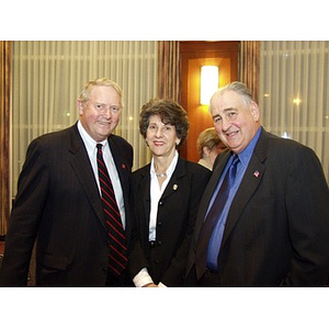 Neal Finnegan (CBA '61), left, and Harry P. Keegan III (CBA '64), right, pose for photograph at the College of Business Administration's Distinguished Service Awards ceremony