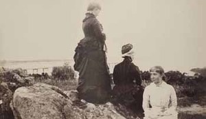 Mrs. Ellerton Pratt, Mrs. George D. Howe, and Alice Pratt on rocks at Smith's Point
