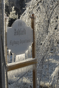 Ice-covered sign for the Ashfield Highway Department