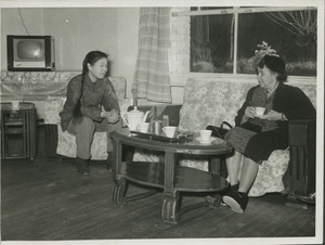 Shirley Graham Du Bois having tea with unidentified woman