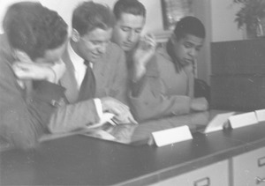 Patrick Santin and William Evans with two unidentified men