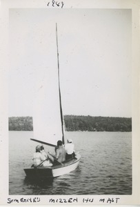Unidentified men and women on a sailboat