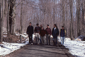 Norman E. Borlaug field trip to the Hopkins Memorial Forest. 2. Left to right: Permanent Plotters Tim Billo (Class of 1997), Henry W. Art, Peter McChesney (Class of 1975), Dawn Biehler (Class of 1997), Norman E. Borlaug (U MN, Class of 1937), Ben Montgomery (Class of 1998), and Emilie Grossmann (Class of 1996) walk in the Hopkins Forest.