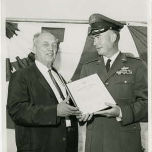 Anthony J. Stonina - receives a certificate of appreciation from U.S. Air Force