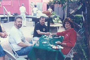 Three Unidentified People at the 1997 Christmas in July Festival