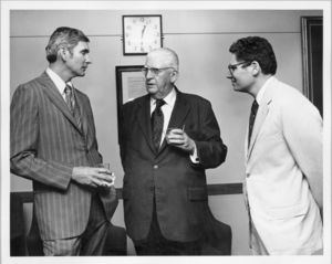 Vice President and Treasurer Francis X. Flannery (left) with Dean Donald R. Simpson (Law) and Vice President Donald Grunewald (right) at a Suffolk University event