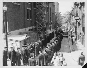 Suffolk University faculty procession, entering Methodist Episcopal Church on Temple Street at the university's first Baccalaureate exercises