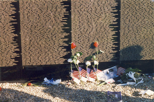 Close-up of Vietnam Memorial Moving Wall with tokens placed there