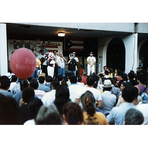 Performers at a rainy Festival Betances.