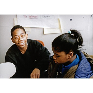 Boy and girl at a Teen Empowerment Program session.