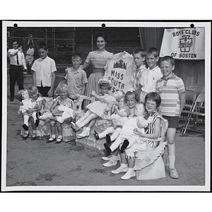 Mary Ann Mobley, Miss America 1959, posing with the Little Sister Contest winners and their brothers