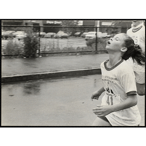 A girl participates in the Battle of Bunker Hill Road Race