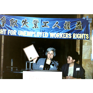 Speaker and Suzanne Lee at an unemployment insurance rally